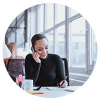 Woman taking a call while working